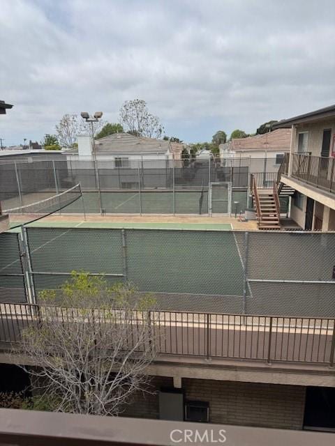 2501 W Redondo Beach Blvd Unit 317, Gardena, CA 90249 - view of tennis court with stairs