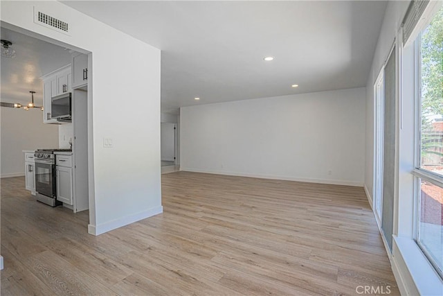 20157 Mckay Dr, Walnut, CA 91789 - spare room with light wood-style flooring, a chandelier, and recessed lighting