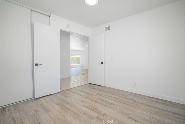 20157 Mckay Dr, Walnut, CA 91789 - unfurnished bedroom with light wood-type flooring and a closet