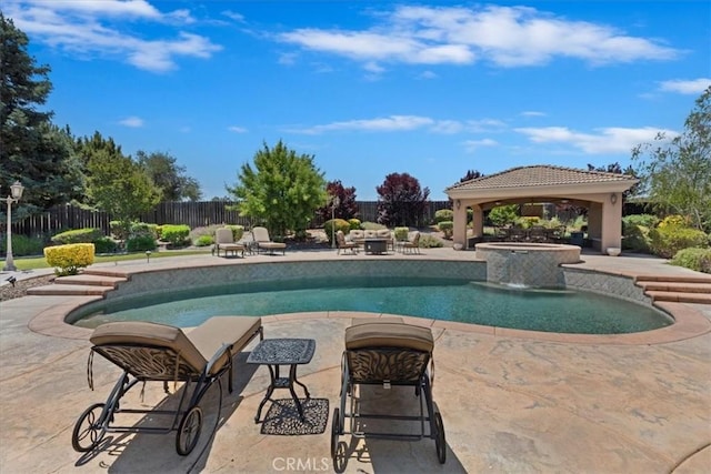22515 Santa Clarita Corte, Perris, CA 92570 - view of pool featuring a gazebo, a patio area, a fenced backyard, and a pool with connected hot tub