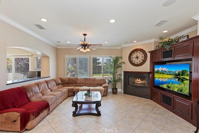 22515 Santa Clarita Corte, Perris, CA 92570 - living area with a glass covered fireplace, recessed lighting, light tile patterned floors, a ceiling fan, and ornamental molding