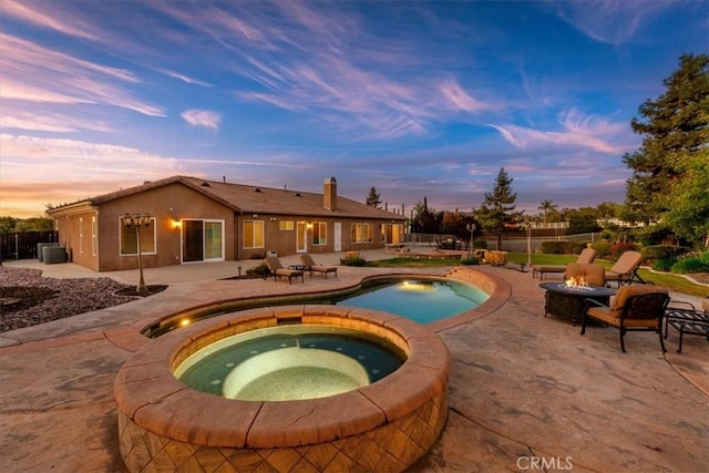 22515 Santa Clarita Corte, Perris, CA 92570 - view of swimming pool with a fire pit, a patio, and a pool with connected hot tub