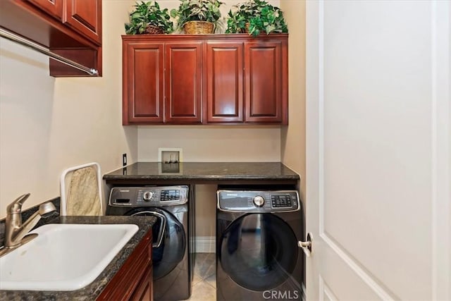 22515 Santa Clarita Corte, Perris, CA 92570 - laundry room with washing machine and dryer, cabinet space, and tile patterned floors