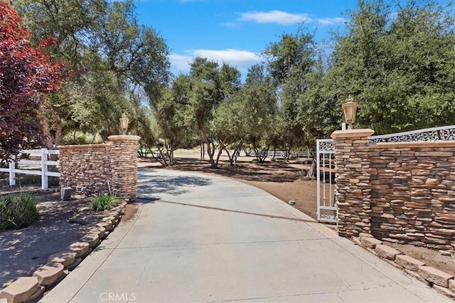 22515 Santa Clarita Corte, Perris, CA 92570 - gate featuring view of scattered trees