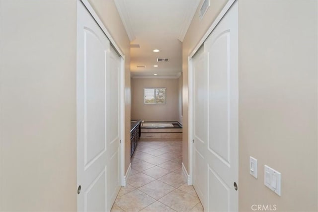 22515 Santa Clarita Corte, Perris, CA 92570 - hall featuring crown molding, light tile patterned flooring, and recessed lighting