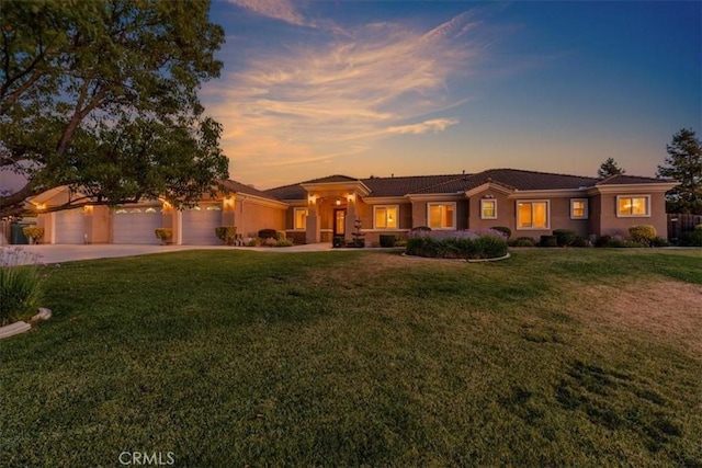 22515 Santa Clarita Corte, Perris, CA 92570 - view of front of home featuring an attached garage, a front yard, driveway, and stucco siding