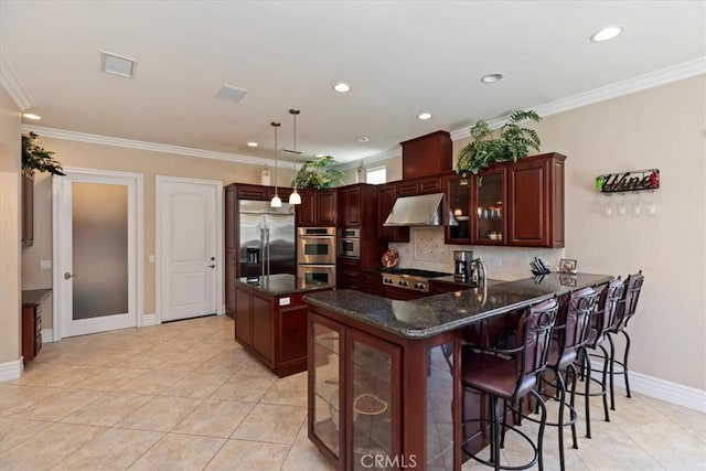22515 Santa Clarita Corte, Perris, CA 92570 - kitchen with appliances with stainless steel finishes, range hood, a peninsula, backsplash, and ornamental molding