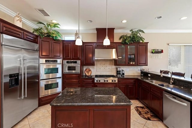 22515 Santa Clarita Corte, Perris, CA 92570 - kitchen featuring appliances with stainless steel finishes, light tile patterned flooring, under cabinet range hood, tasteful backsplash, and ornamental molding