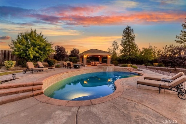 22515 Santa Clarita Corte, Perris, CA 92570 - pool at dusk with a gazebo and a patio