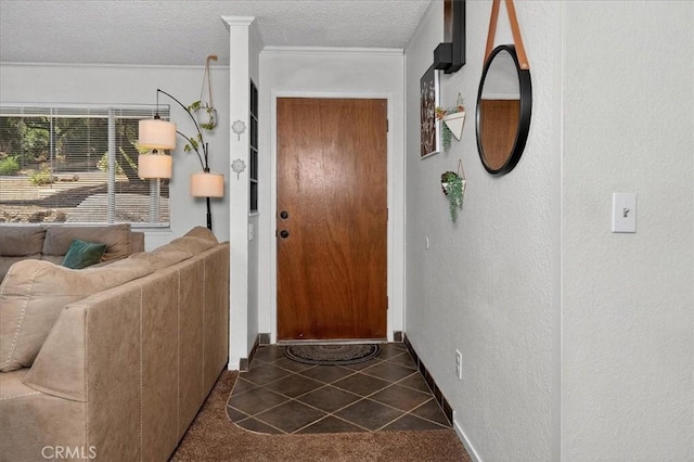5566 Darrah Rd, Mariposa, CA 95338 - entryway with a textured ceiling, a textured wall, and dark tile patterned floors