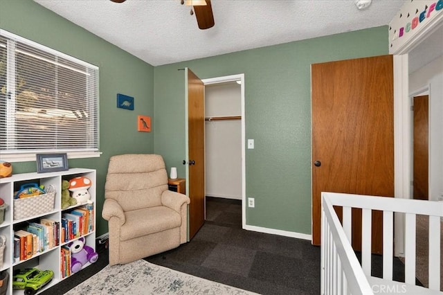 5566 Darrah Rd, Mariposa, CA 95338 - bedroom with a textured ceiling, dark carpet, and a ceiling fan