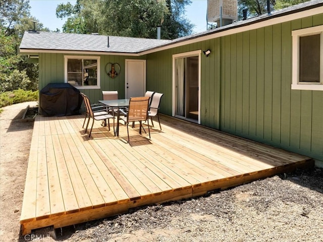 5566 Darrah Rd, Mariposa, CA 95338 - wooden terrace with outdoor dining area and area for grilling