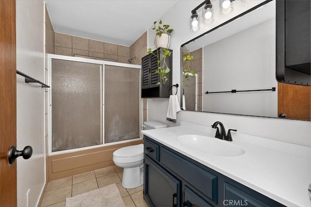 5566 Darrah Rd, Mariposa, CA 95338 - full bathroom featuring vanity, tile patterned floors, and enclosed tub / shower combo