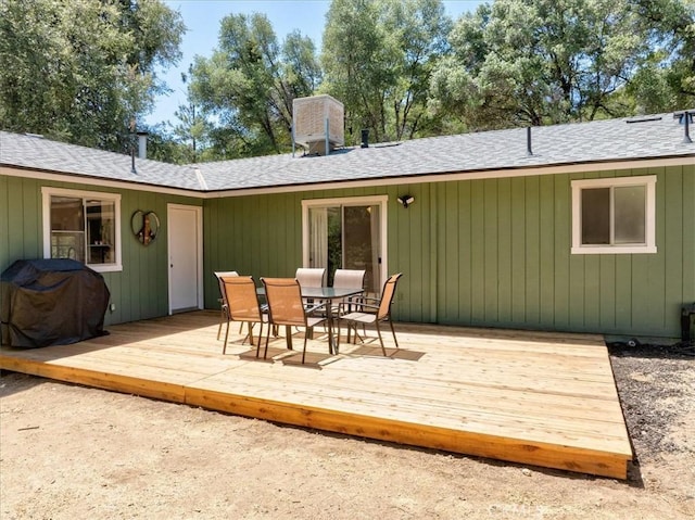 5566 Darrah Rd, Mariposa, CA 95338 - wooden deck with a grill and outdoor dining space