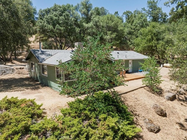5566 Darrah Rd, Mariposa, CA 95338 - rear view of house featuring roof with shingles, a wooden deck, and view of scattered trees