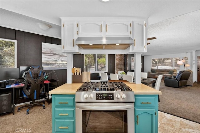 5566 Darrah Rd, Mariposa, CA 95338 - kitchen featuring gas range, white cabinetry, under cabinet range hood, light carpet, and open floor plan