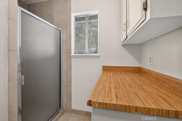 5566 Darrah Rd, Mariposa, CA 95338 - interior space with a shower stall and tile patterned floors
