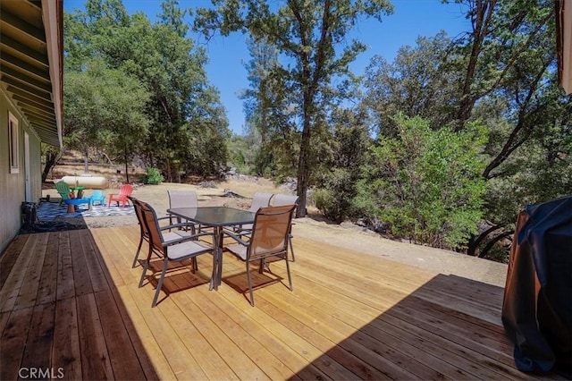 5566 Darrah Rd, Mariposa, CA 95338 - wooden deck featuring outdoor dining area and an outdoor hangout area
