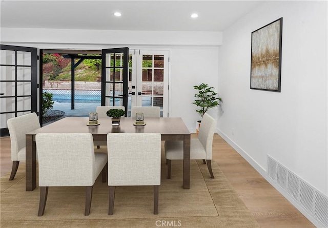 1214 Wilder St, Thousand Oaks, CA 91362 - dining area featuring french doors, light wood-style floors, and recessed lighting