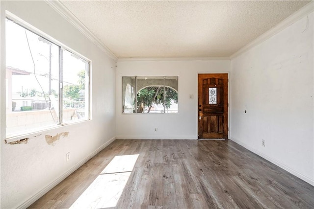 4576 166th St, Lawndale, CA 90260 - entrance foyer with a textured ceiling, wood finished floors, and ornamental molding