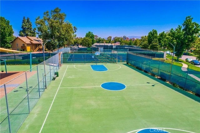 321 Orange Blossom Unit 166, Irvine, CA 92618 - view of tennis court with community basketball court