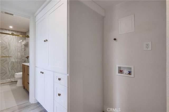 321 Orange Blossom Unit 166, Irvine, CA 92618 - laundry room featuring hookup for a washing machine