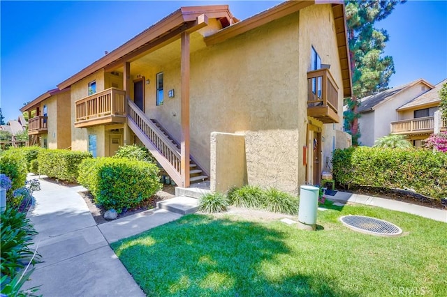 321 Orange Blossom Unit 166, Irvine, CA 92618 - view of building exterior featuring stairway