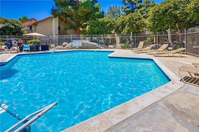 321 Orange Blossom Unit 166, Irvine, CA 92618 - community pool featuring a patio area