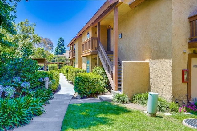 321 Orange Blossom Unit 166, Irvine, CA 92618 - surrounding community with stairs and a yard