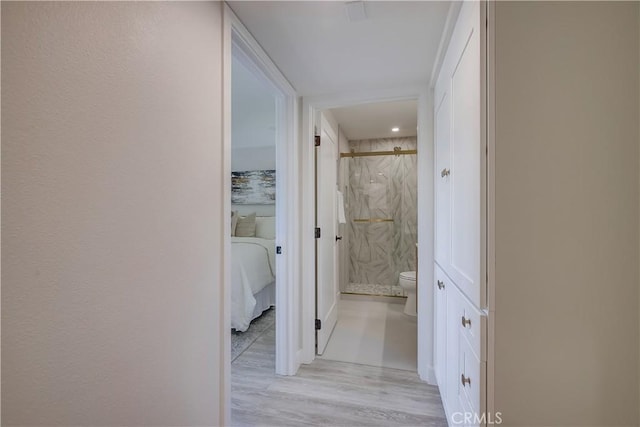 321 Orange Blossom Unit 166, Irvine, CA 92618 - hallway with light wood-style flooring