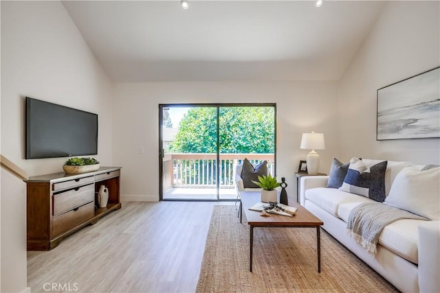 321 Orange Blossom Unit 166, Irvine, CA 92618 - living area with light wood-type flooring and baseboards