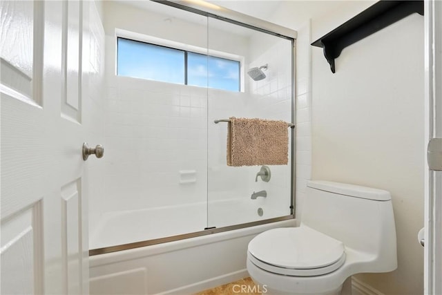 14 Bridgewood Unit 22, Irvine, CA 92604 - bathroom featuring toilet and bath / shower combo with glass door