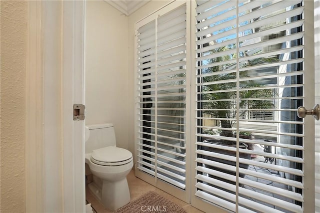 14 Bridgewood Unit 22, Irvine, CA 92604 - bathroom featuring tile patterned floors and ornamental molding