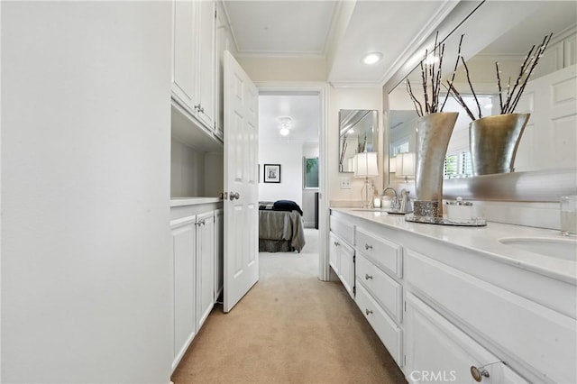 14 Bridgewood Unit 22, Irvine, CA 92604 - ensuite bathroom with double vanity and ornamental molding