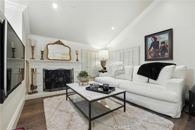 14 Bridgewood Unit 22, Irvine, CA 92604 - living area featuring lofted ceiling, wood finished floors, ornamental molding, a fireplace with raised hearth, and recessed lighting