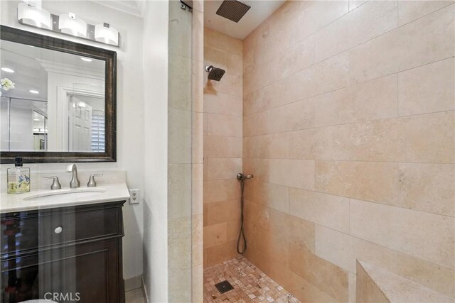 14 Bridgewood Unit 22, Irvine, CA 92604 - full bathroom with tiled shower, vanity, and crown molding