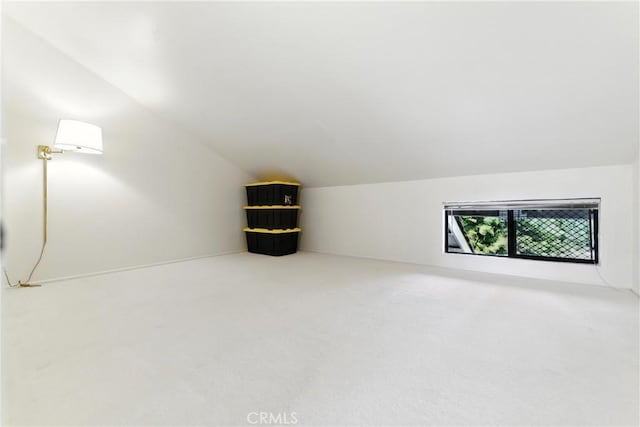 14 Bridgewood Unit 22, Irvine, CA 92604 - bonus room featuring vaulted ceiling and carpet floors