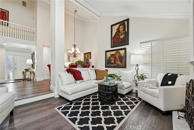 14 Bridgewood Unit 22, Irvine, CA 92604 - living room with dark wood finished floors, a chandelier, crown molding, and high vaulted ceiling