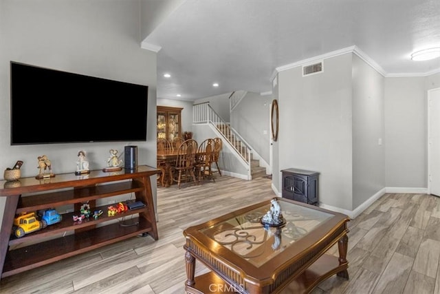 817 Granite Privado, Ontario, CA 91762 - living area with stairs, light wood-type flooring, crown molding, and recessed lighting