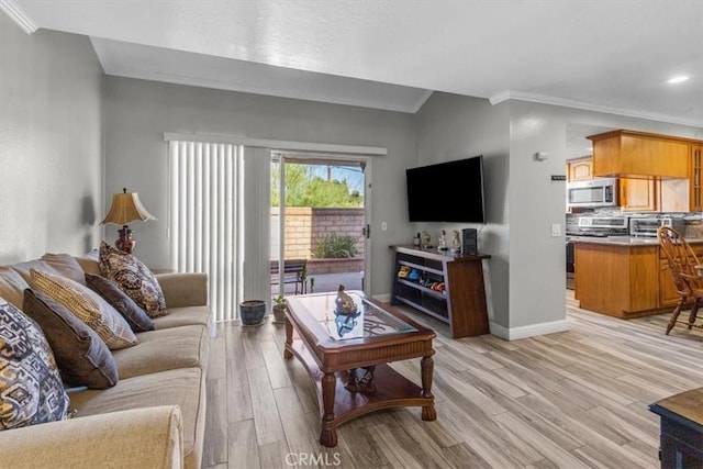 817 Granite Privado, Ontario, CA 91762 - living room featuring crown molding and light wood-type flooring