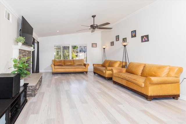 24093 Sargeant Rd, Ramona, CA 92065 - living room featuring ceiling fan, light wood-style floors, ornamental molding, and vaulted ceiling