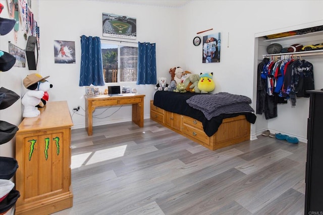 24093 Sargeant Rd, Ramona, CA 92065 - bedroom featuring a closet and wood finished floors