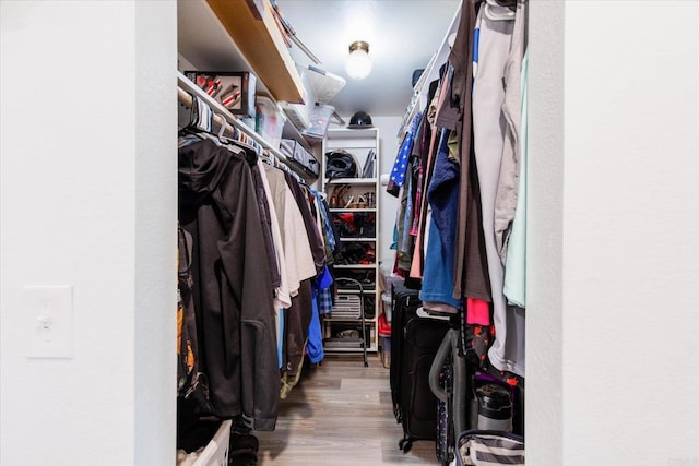 24093 Sargeant Rd, Ramona, CA 92065 - spacious closet featuring wood finished floors