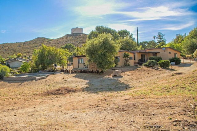 24093 Sargeant Rd, Ramona, CA 92065 - view of front of home featuring a mountain view and stucco siding
