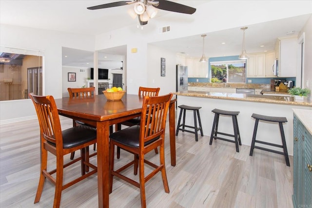 24093 Sargeant Rd, Ramona, CA 92065 - dining space featuring a ceiling fan and light wood finished floors