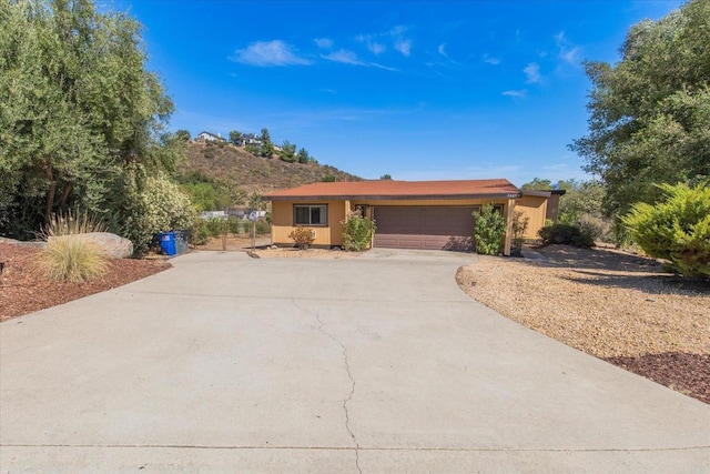 24093 Sargeant Rd, Ramona, CA 92065 - view of front of home featuring concrete driveway and an attached garage