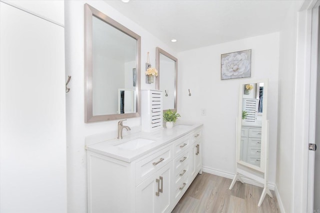 24093 Sargeant Rd, Ramona, CA 92065 - bathroom featuring vanity and wood finished floors