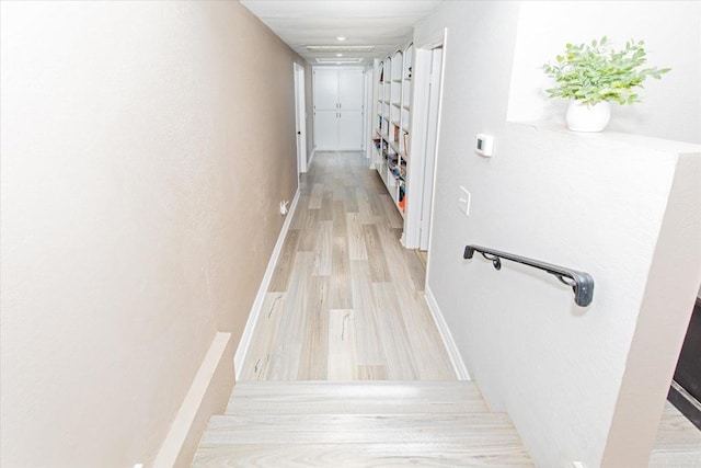 24093 Sargeant Rd, Ramona, CA 92065 - hallway featuring light wood-type flooring and baseboards