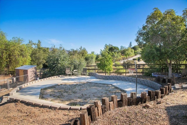 24093 Sargeant Rd, Ramona, CA 92065 - view of pool featuring a patio, a swimming pool, and an outbuilding