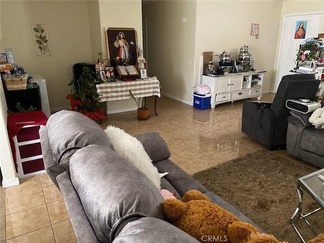 755 N Allen St, Banning, CA 92220 - tiled living area featuring baseboards